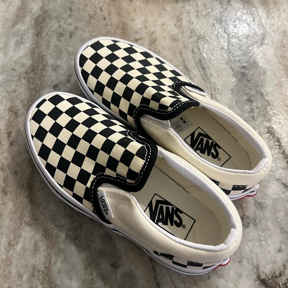Vans Black and White Checkerboard Slip-On Sneakers